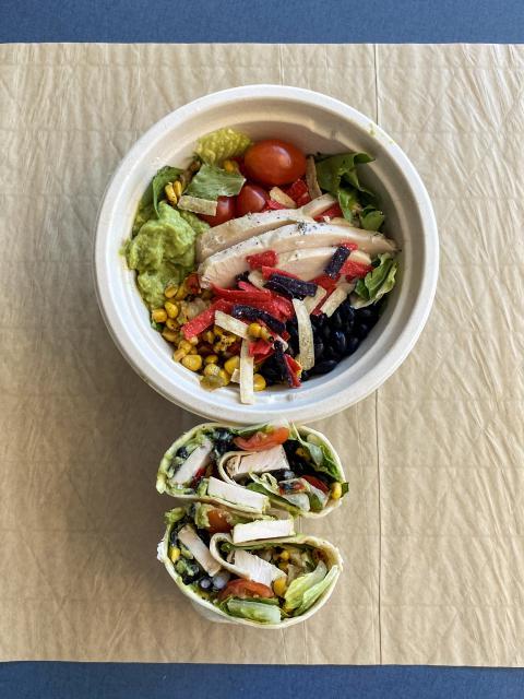 Bowl of salad and a wrap from Creative Greens